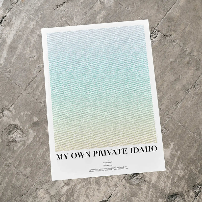 A My Own Private Idaho movie script poster laid flat on a textured floor surface.