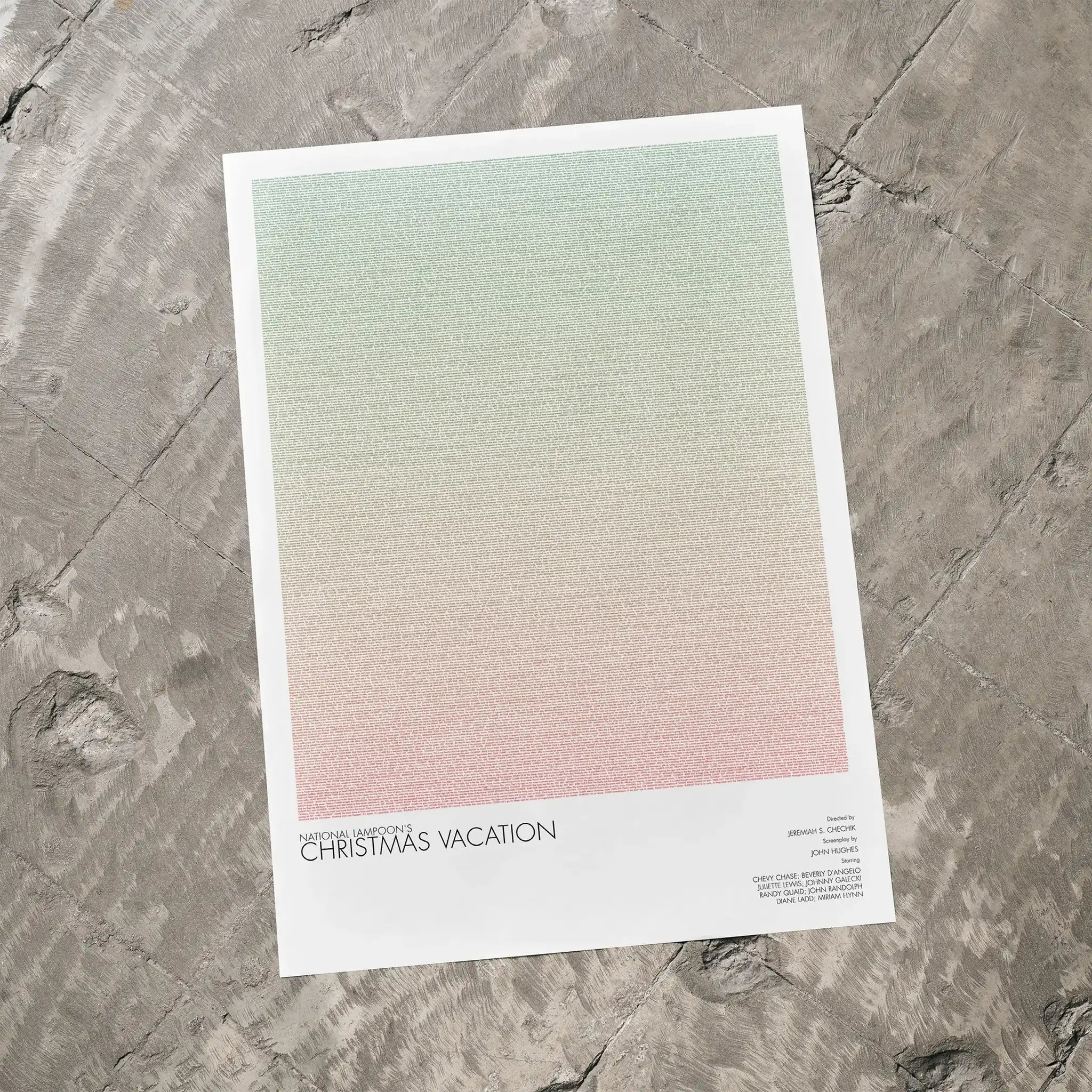 A National Lampoon's Christmas Vacation movie script poster laid flat on a textured floor surface.