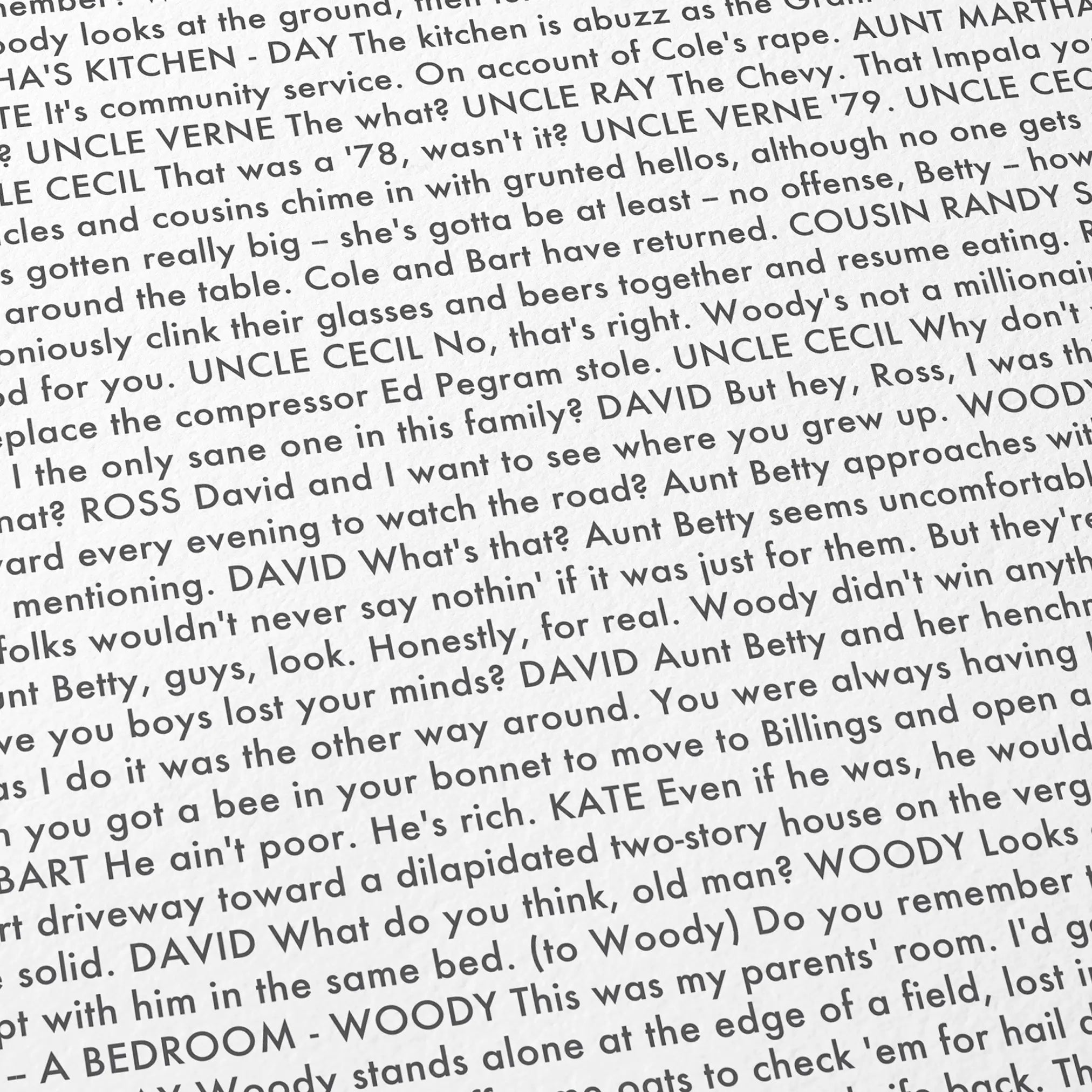 Close-up detail of the Nebraska movie script poster showing dense typographic text.