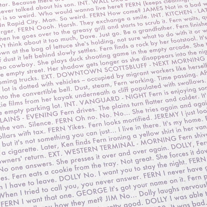 Close-up detail of the Nomadland movie script poster showing dense typographic text.