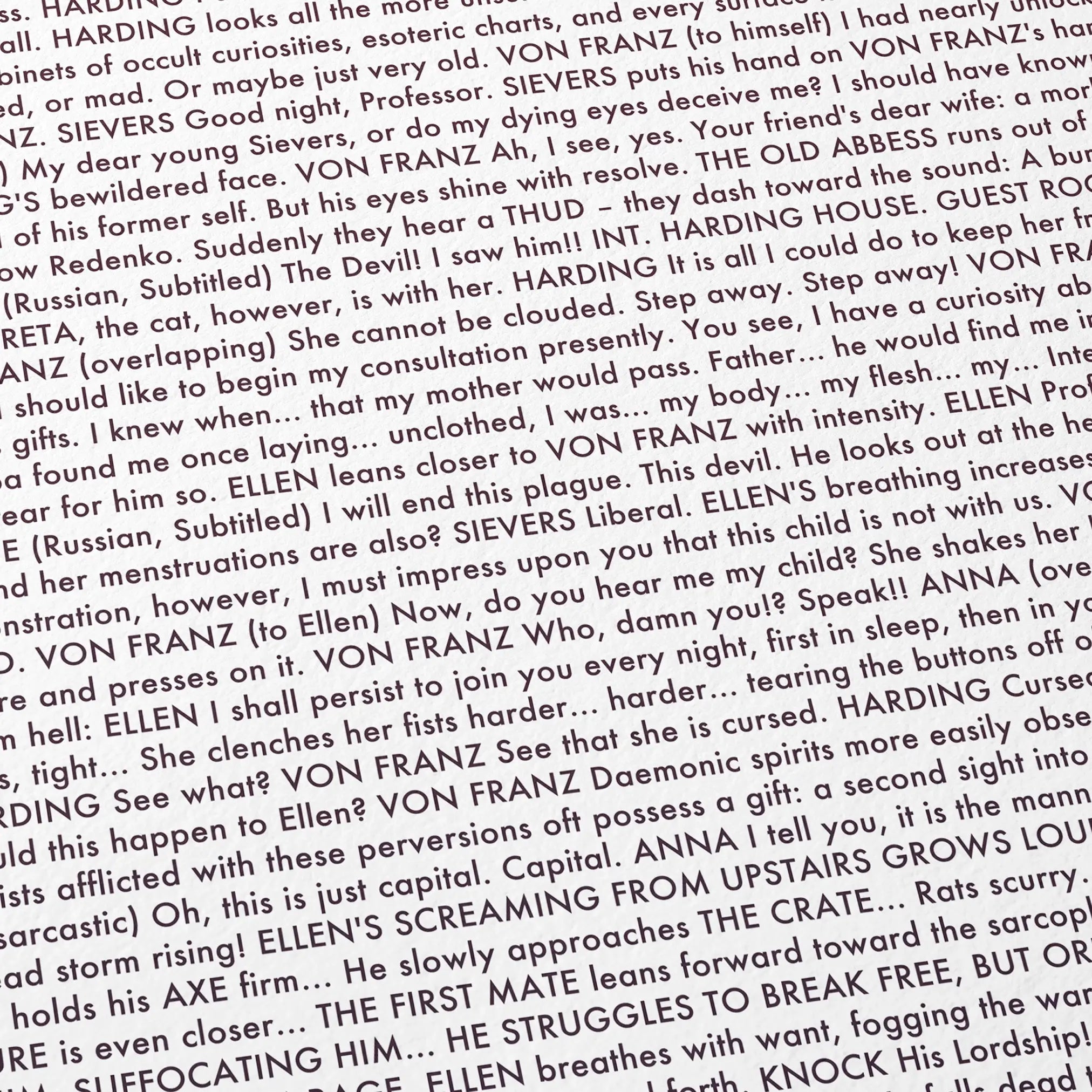 Close-up detail of the Nosferatu movie script poster showing dense typographic text.