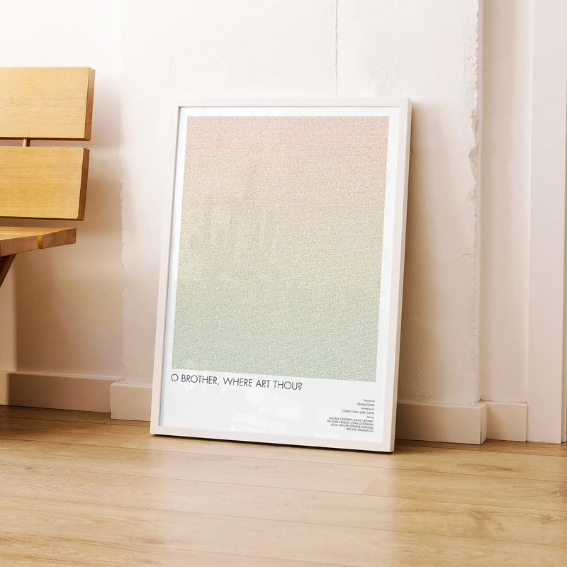 A framed O Brother, Where Art Thou? movie script poster leaning against a wall in a modern interior.