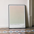 A framed O Brother, Where Art Thou? movie script poster leaning against a wall in a minimalist interior.