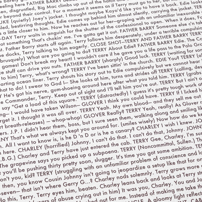 Close-up detail of the On the Waterfront movie script poster showing dense typographic text.