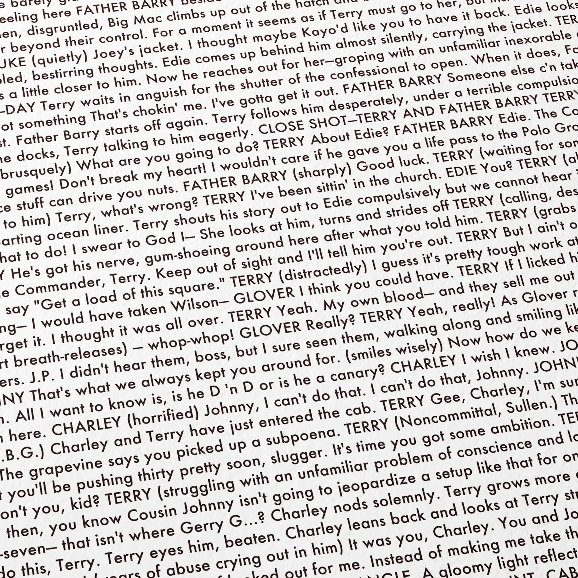 Close-up detail of the On the Waterfront movie script poster showing dense typographic text.