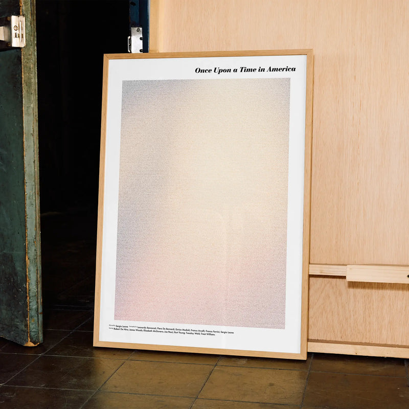 A framed Once Upon a Time in America movie script poster displayed in a contemporary interior setting.