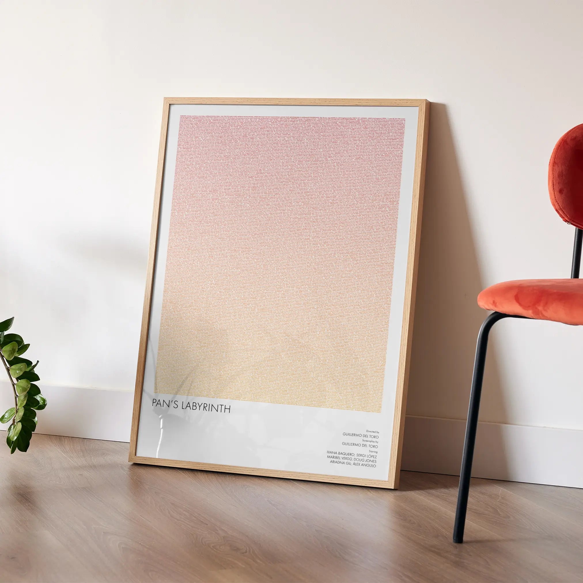 A framed Pan's Labyrinth movie script poster placed in a bright interior environment.