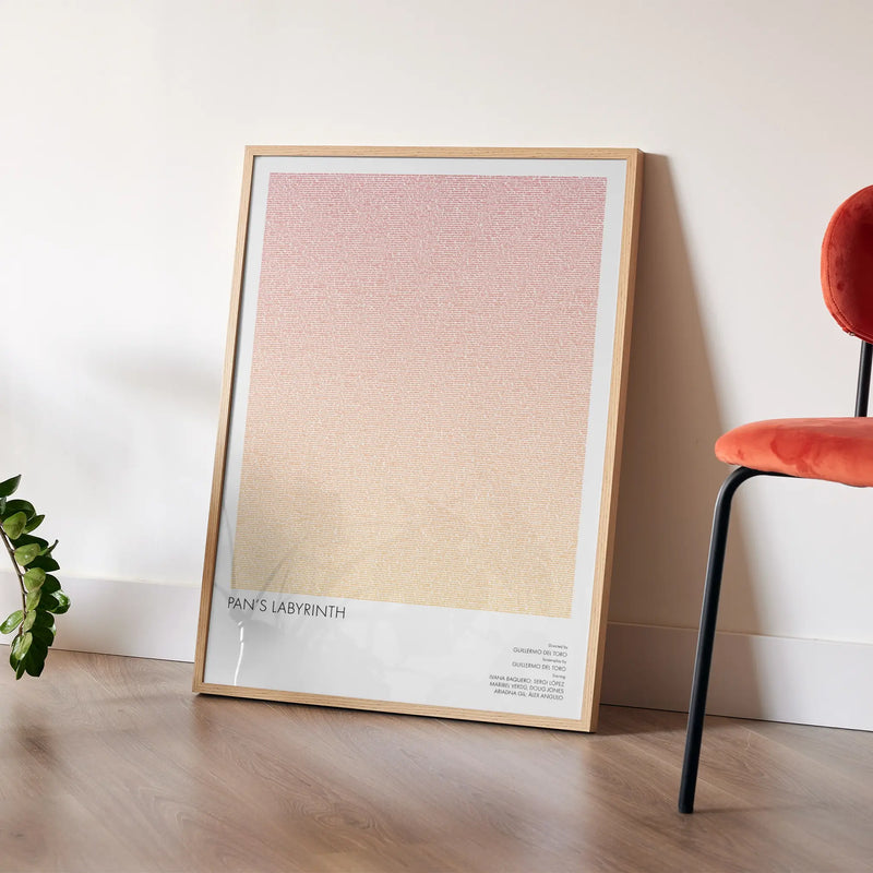 A framed Pan's Labyrinth movie script poster placed in a bright interior environment.