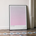 A framed Pitch Perfect movie script poster leaning against a wall in a minimalist interior.