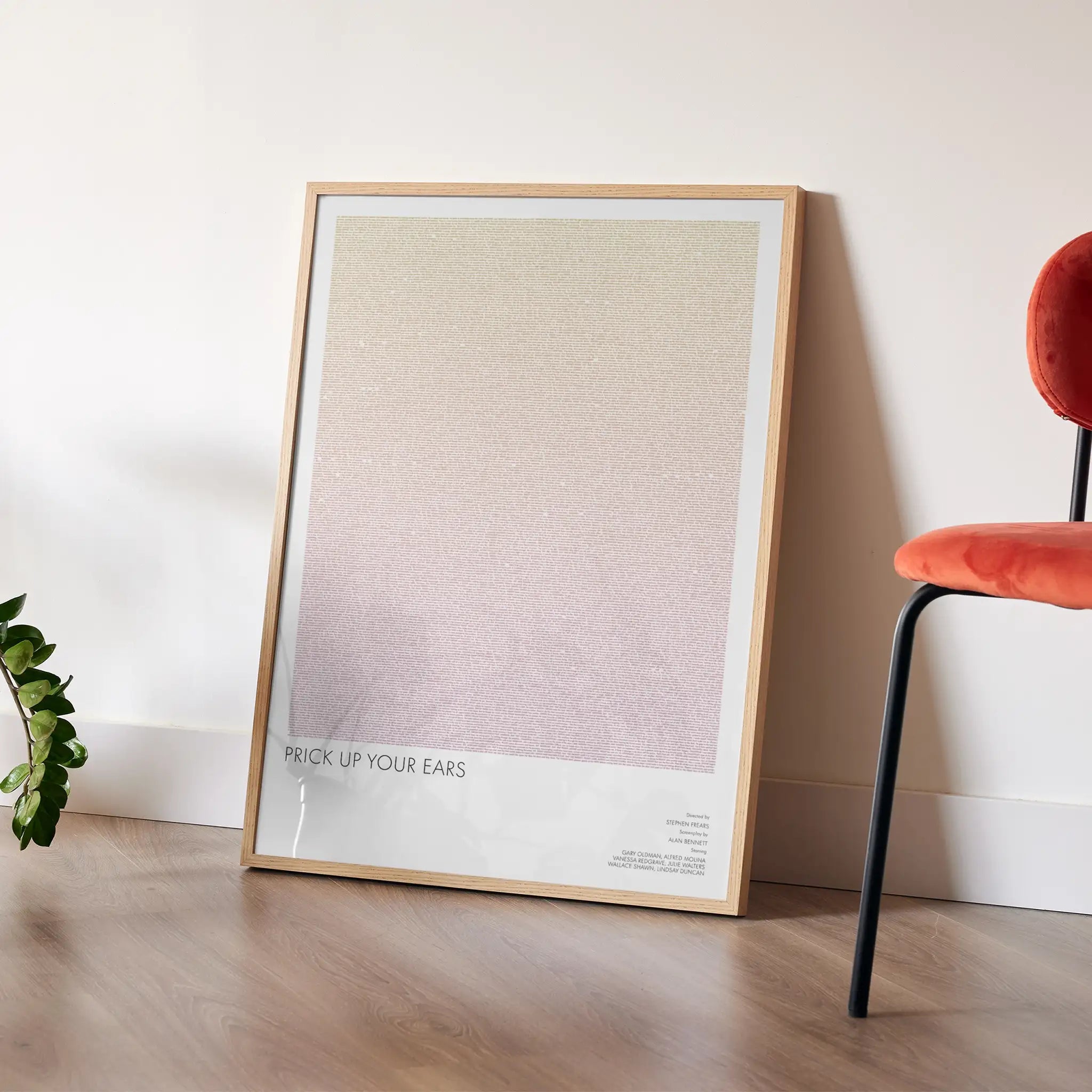 A framed Prick Up Your Ears movie script poster placed in a bright interior environment.