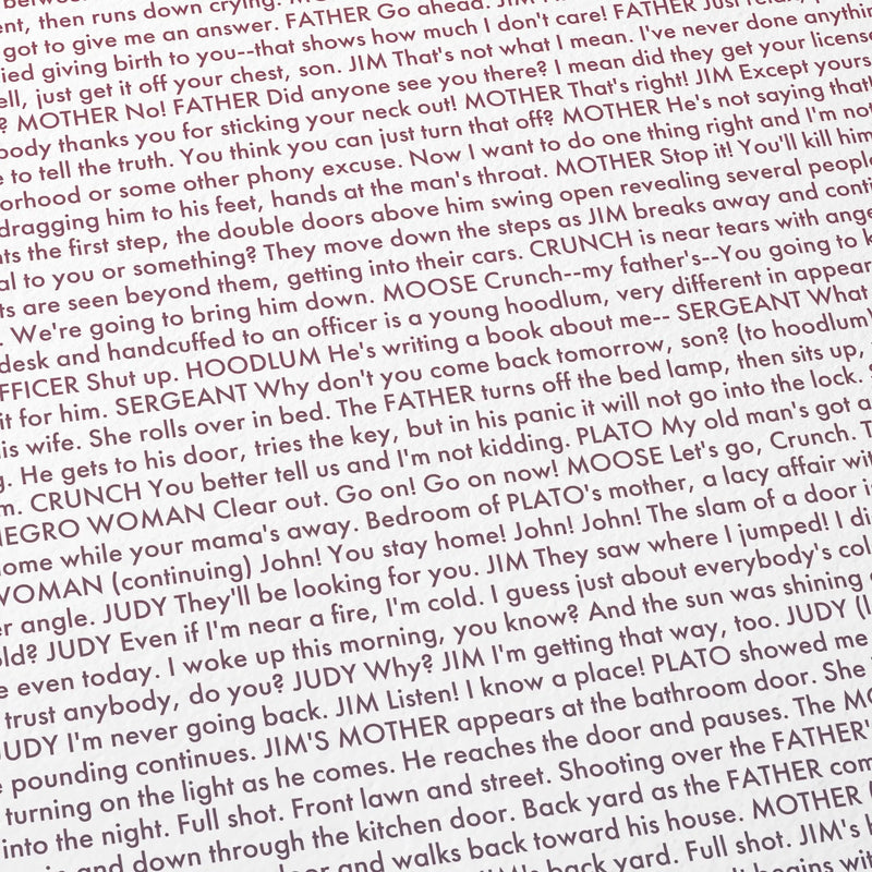 Close-up detail of the Rebel Without a Cause movie script poster showing dense typographic text.