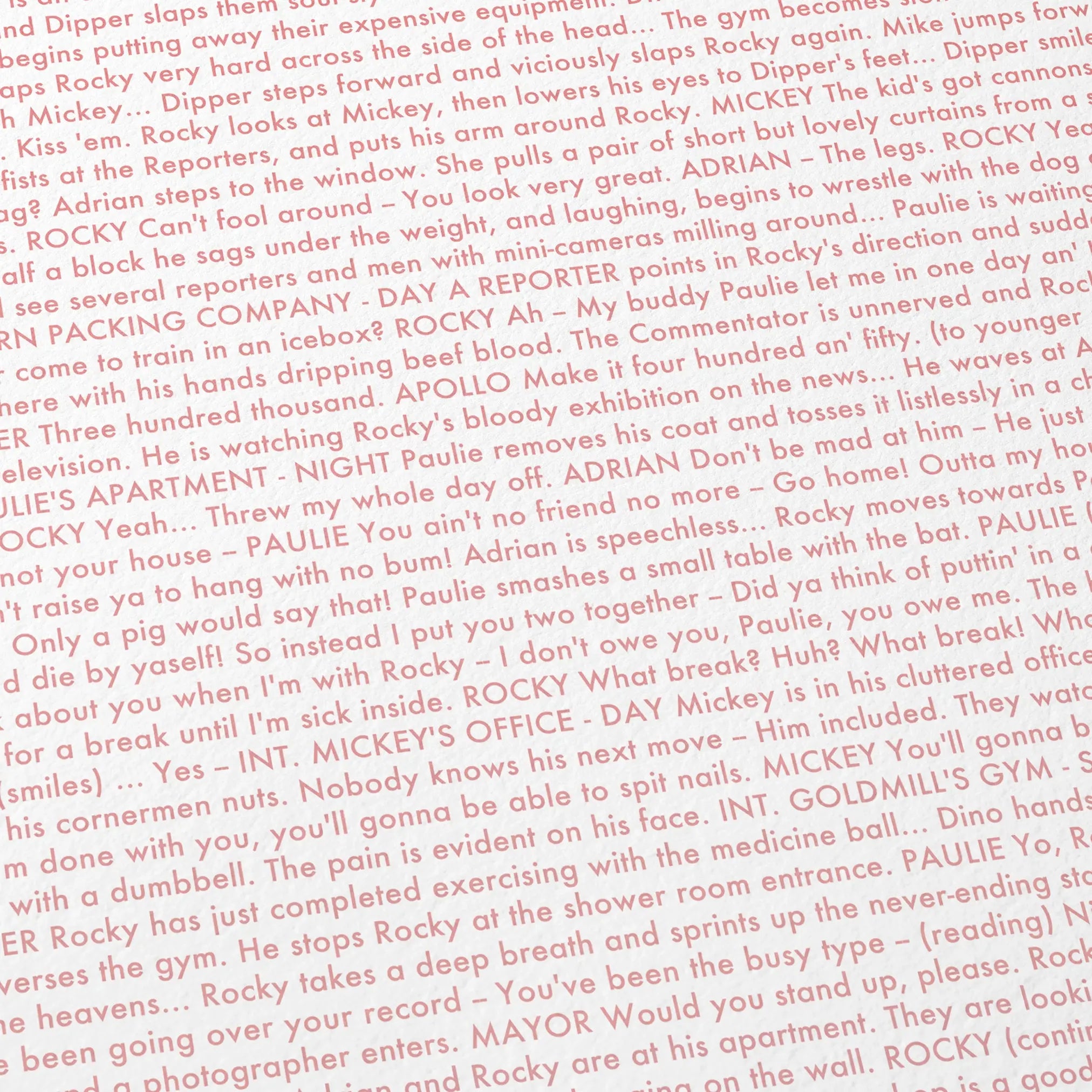 Close-up detail of the Rocky movie script poster showing dense typographic text.