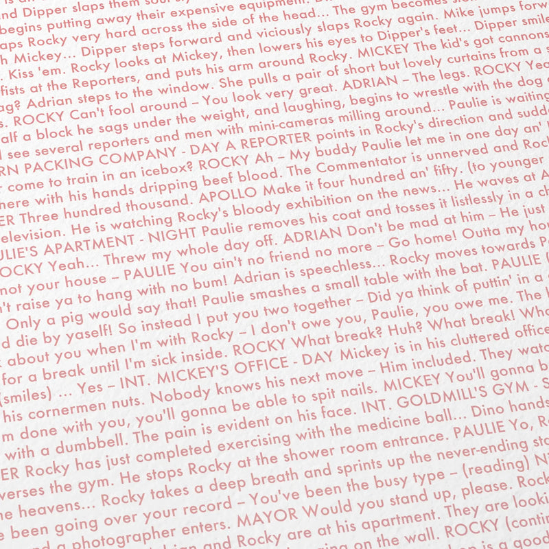 Close-up detail of the Rocky movie script poster showing dense typographic text.