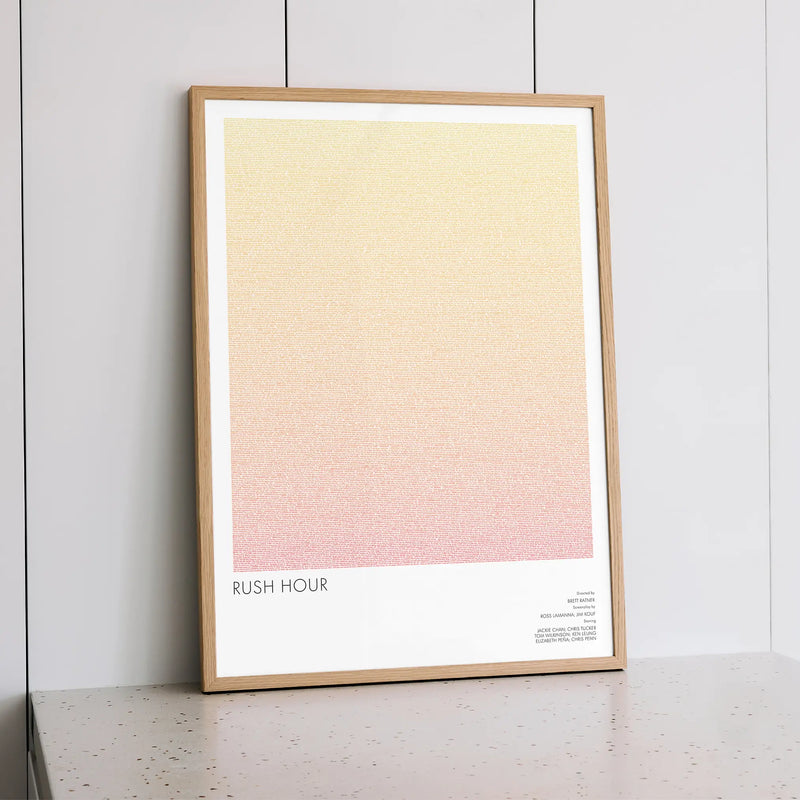 A framed Rush Hour movie script poster styled within a calm interior space.