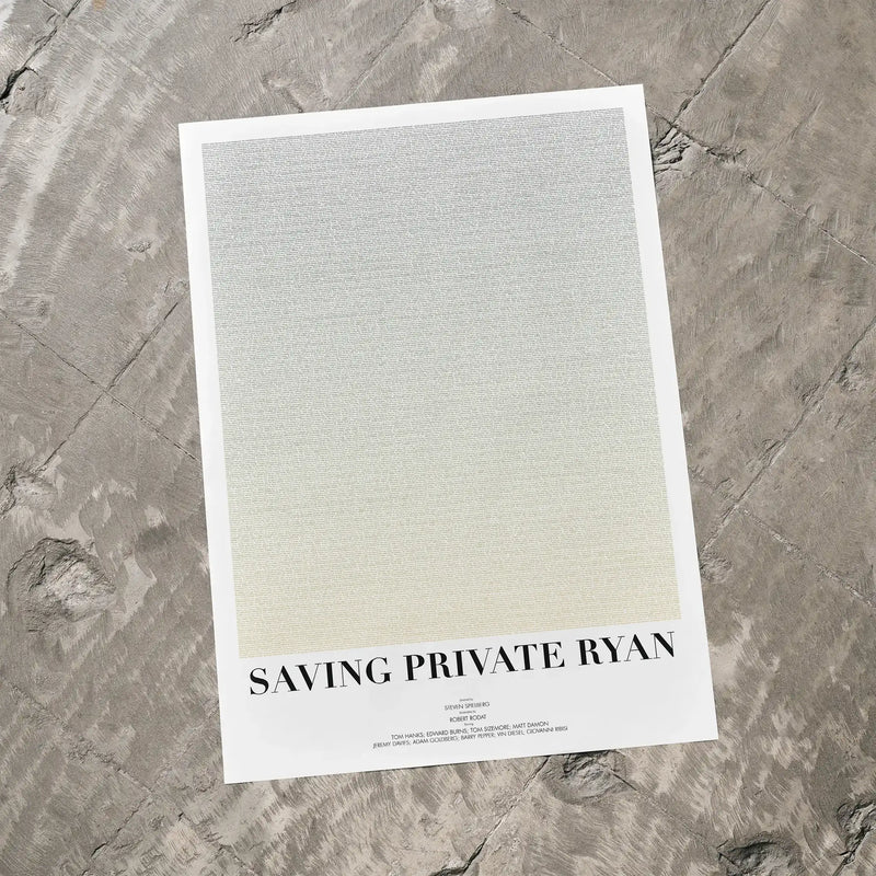 A Saving Private Ryan movie script poster laid flat on a textured floor surface.