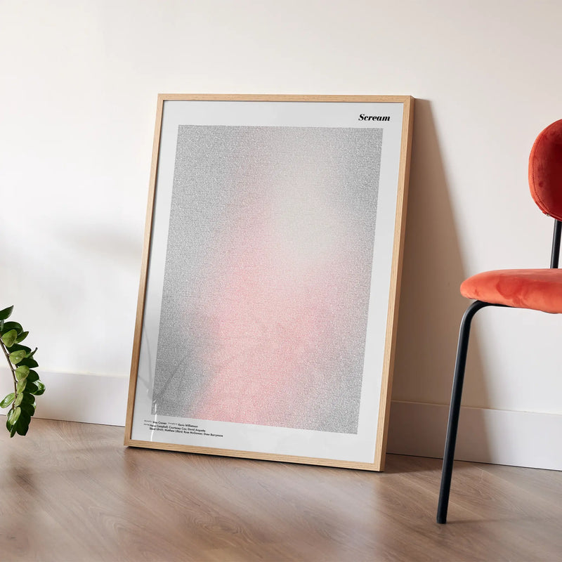 A framed Scream movie script poster placed in a bright interior environment.