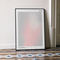 A framed Scream movie script poster leaning against a wall in a minimalist interior.