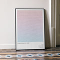 A framed Shakespeare in Love movie script poster leaning against a wall in a minimalist interior.