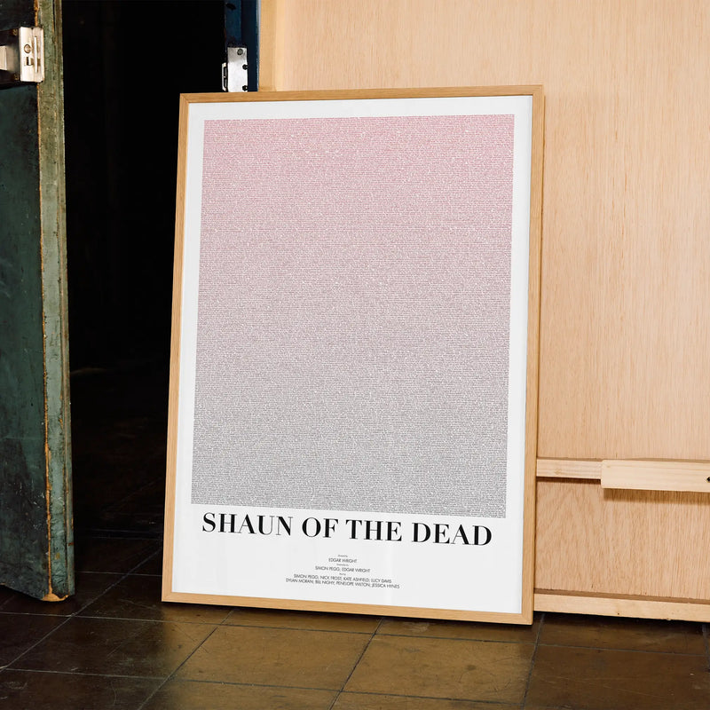 A framed Shaun of the Dead movie script poster displayed in a contemporary interior setting.