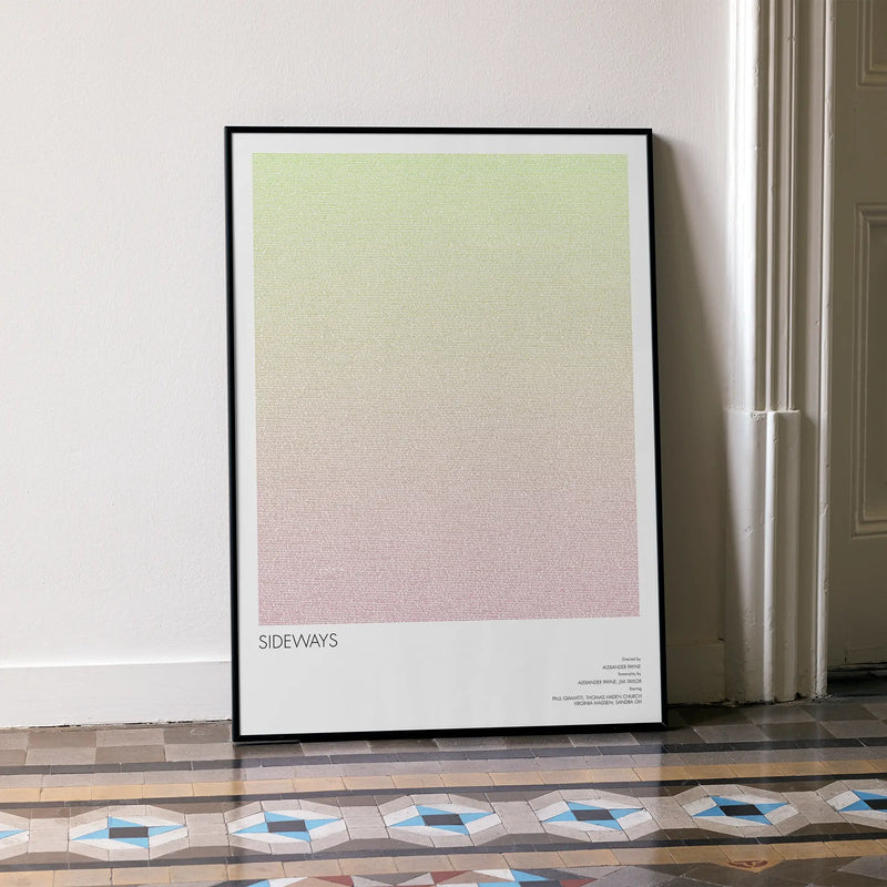A framed Sideways movie script poster leaning against a wall in a minimalist interior.