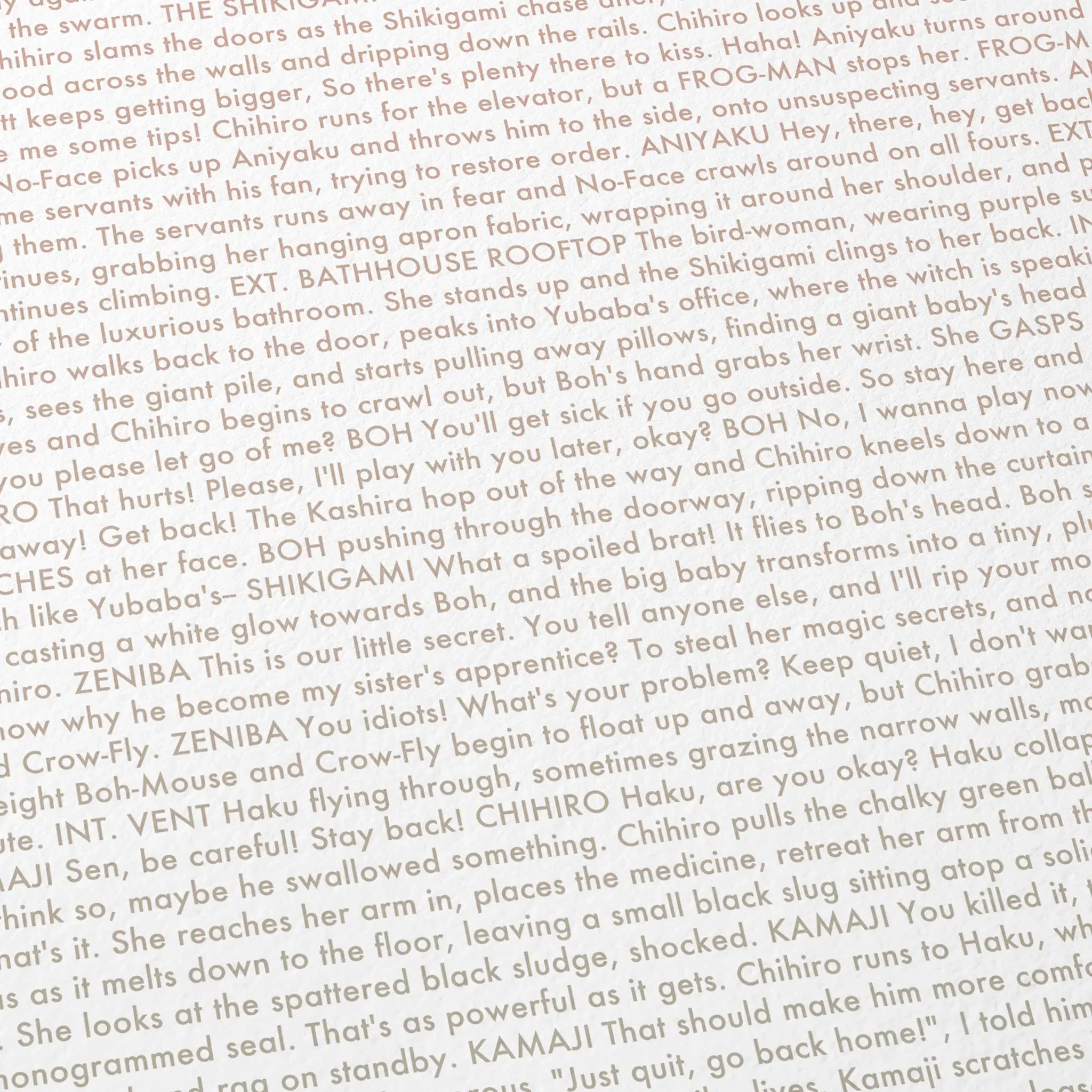 Close-up detail of the Spirited Away movie script poster showing dense typographic text.