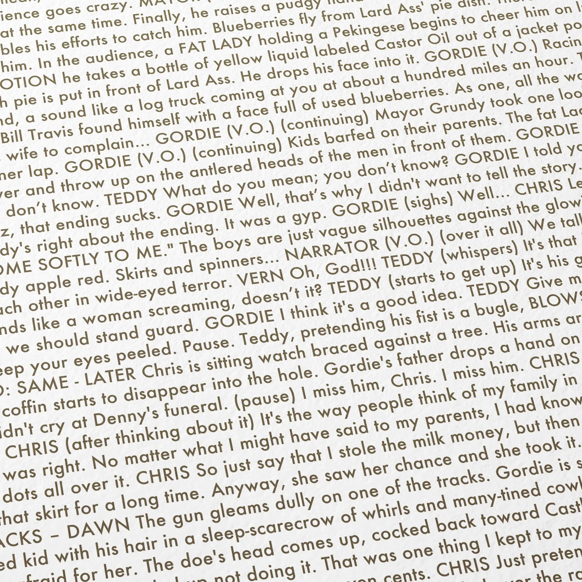 Close-up detail of the Stand by Me movie script poster showing dense typographic text.