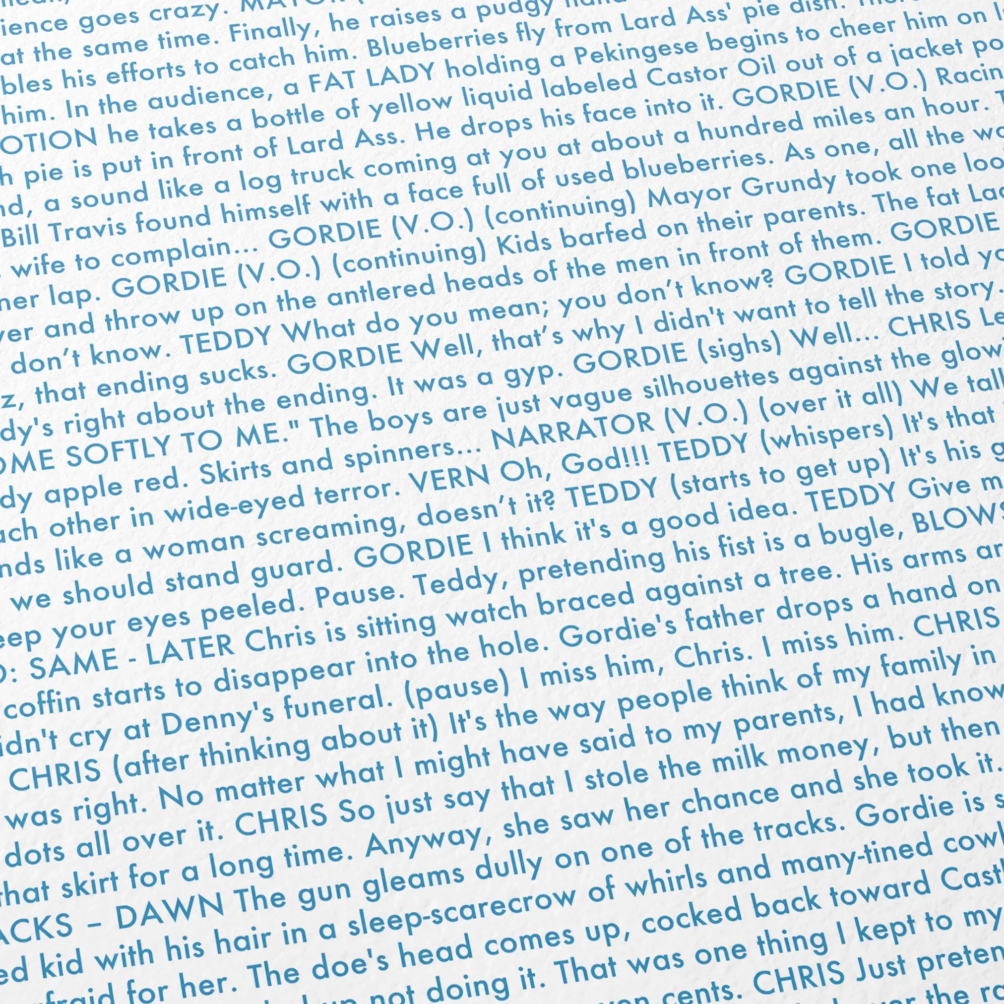 Close-up detail of the Stand by Me movie script poster showing dense typographic text.