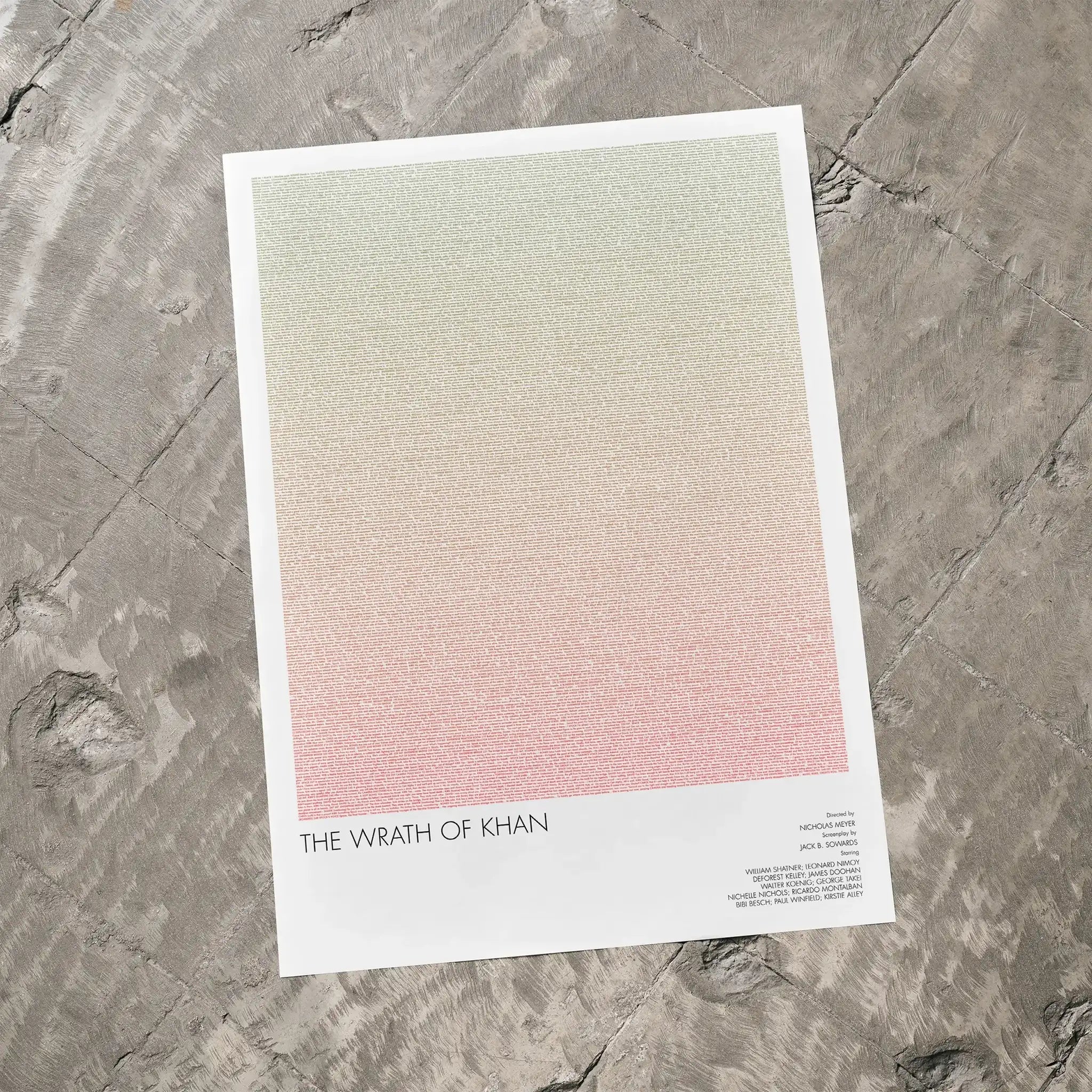 A Star Trek II: The Wrath of Khan movie script poster laid flat on a textured floor surface.