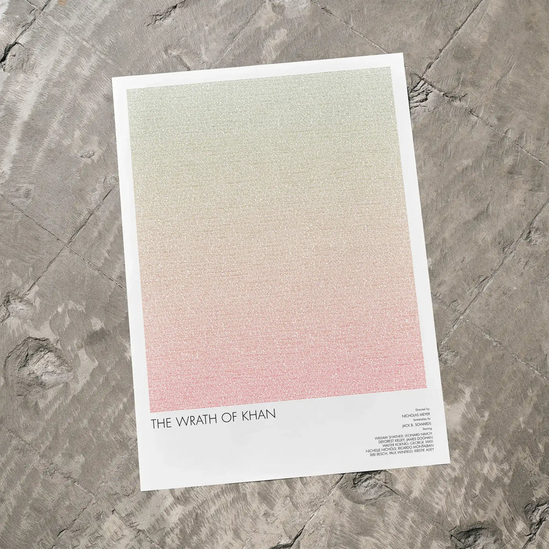 A Star Trek II: The Wrath of Khan movie script poster laid flat on a textured floor surface.