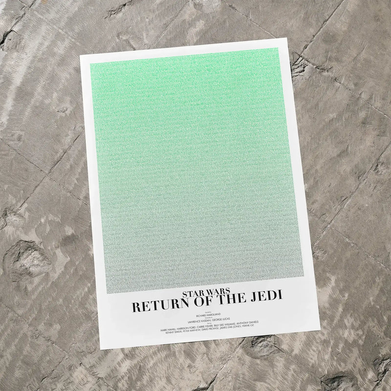 A Star Wars: Return of the Jedi movie script poster laid flat on a textured floor surface.