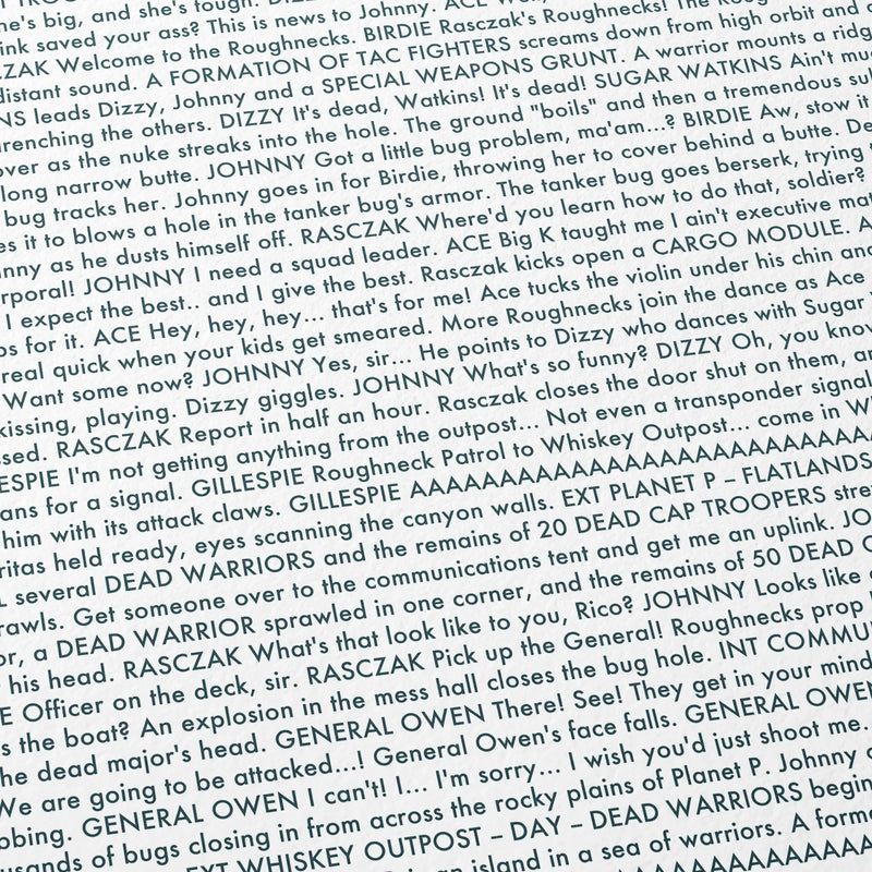 Close-up detail of the Starship Troopers movie script poster showing dense typographic text.