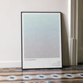 A framed The Apartment movie script poster leaning against a wall in a minimalist interior.