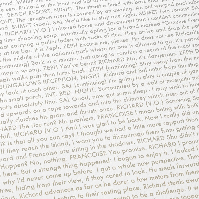 Close-up detail of the The Beach movie script poster showing dense typographic text.