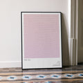A framed The Cell movie script poster leaning against a wall in a minimalist interior.