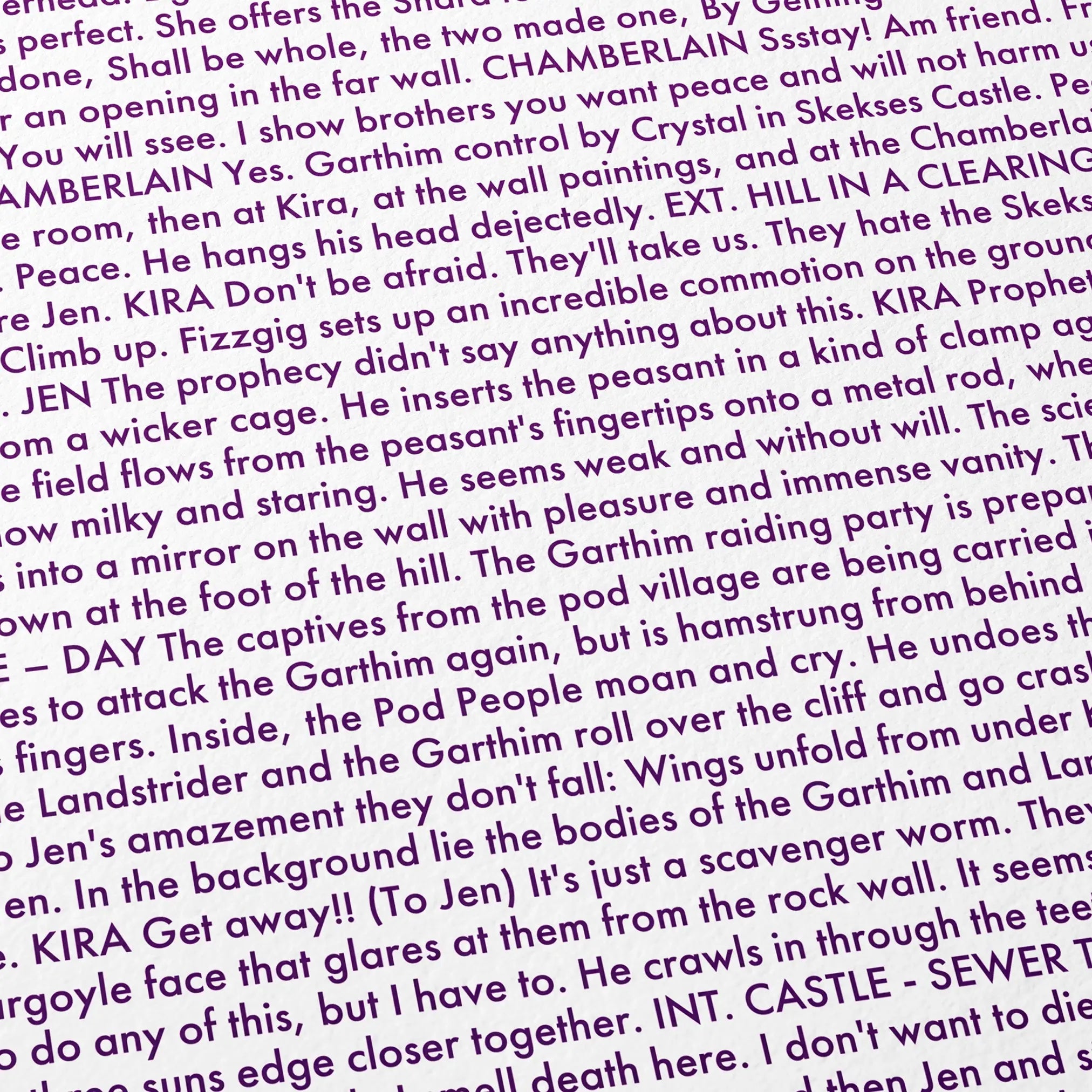 Close-up detail of the The Dark Crystal movie script poster showing dense typographic text.