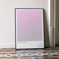 A framed The Dark Crystal movie script poster leaning against a wall in a minimalist interior.