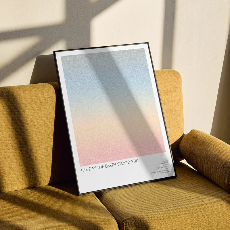 A framed The Day the Earth Stood Still movie script poster styled in a clean interior setting.