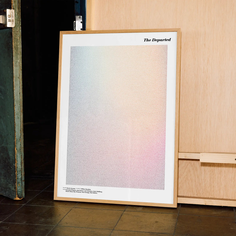 A framed The Departed movie script poster displayed in a contemporary interior setting.