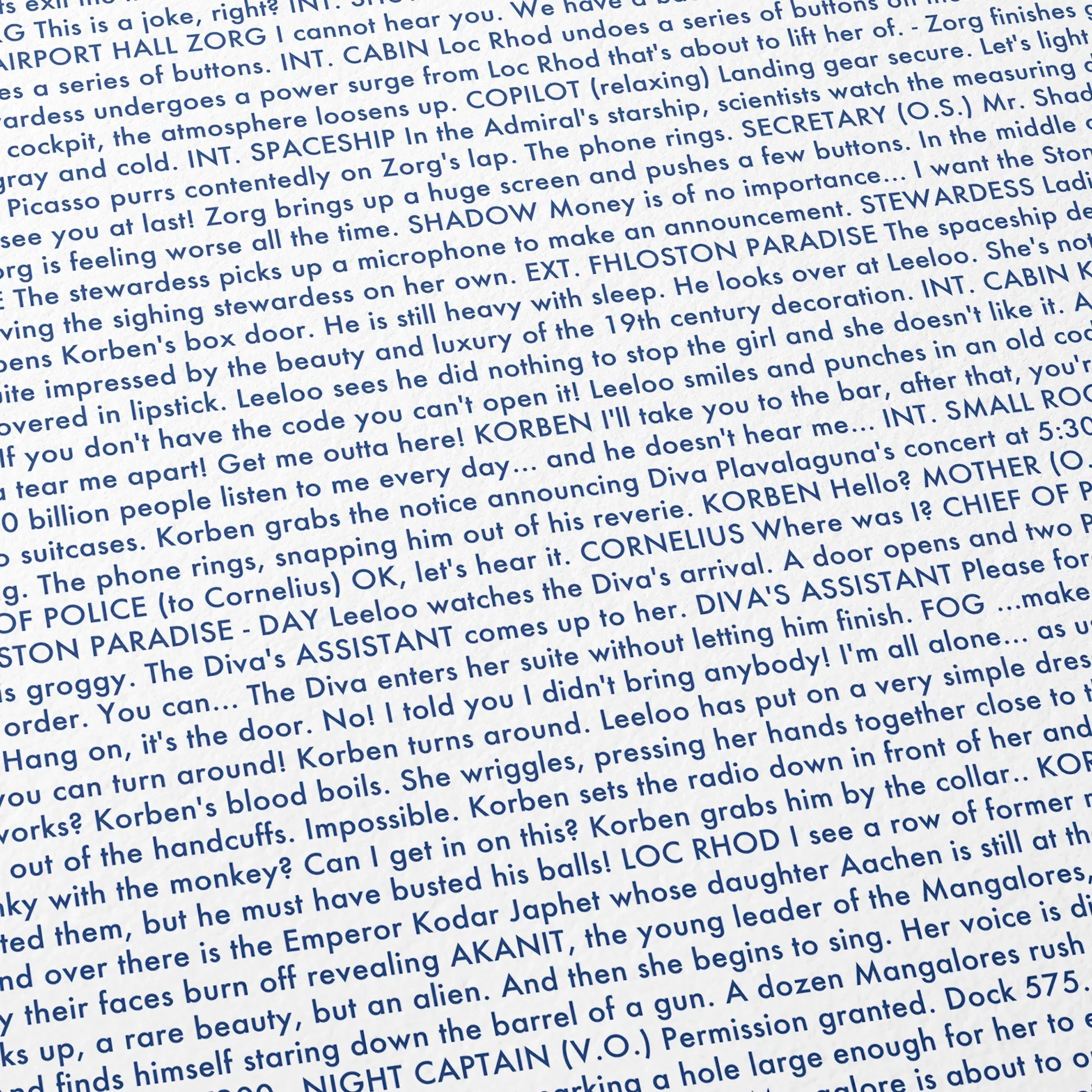 Close-up detail of the The Fifth Element movie script poster showing dense typographic text.