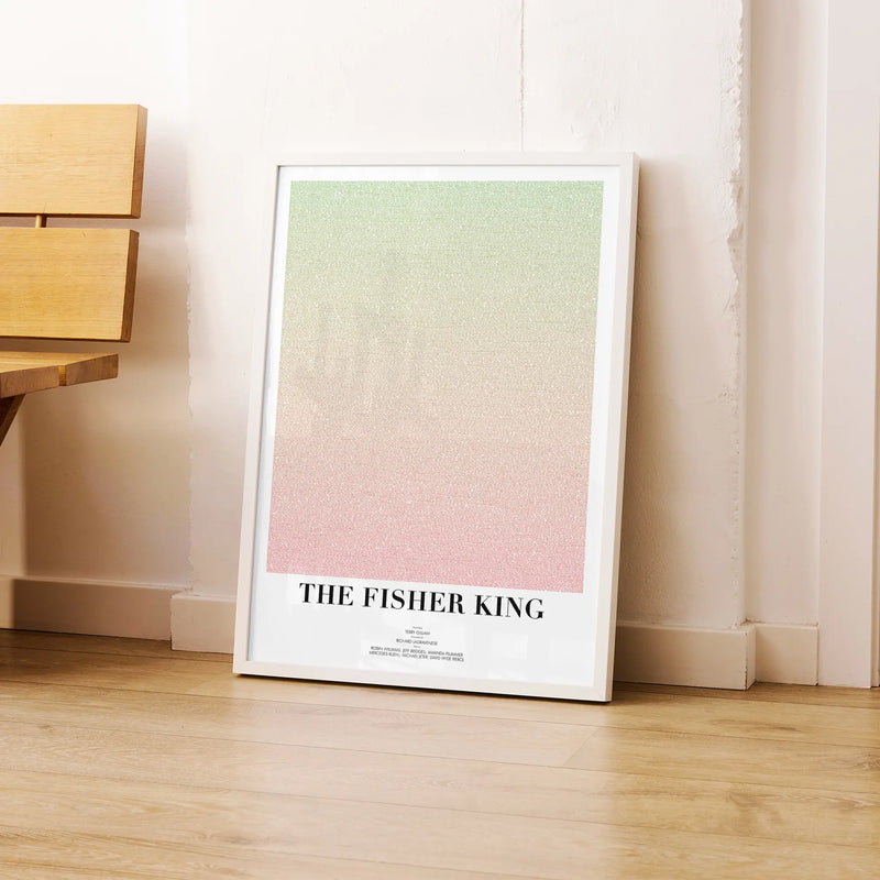 A framed The Fisher King movie script poster leaning against a wall in a modern interior.