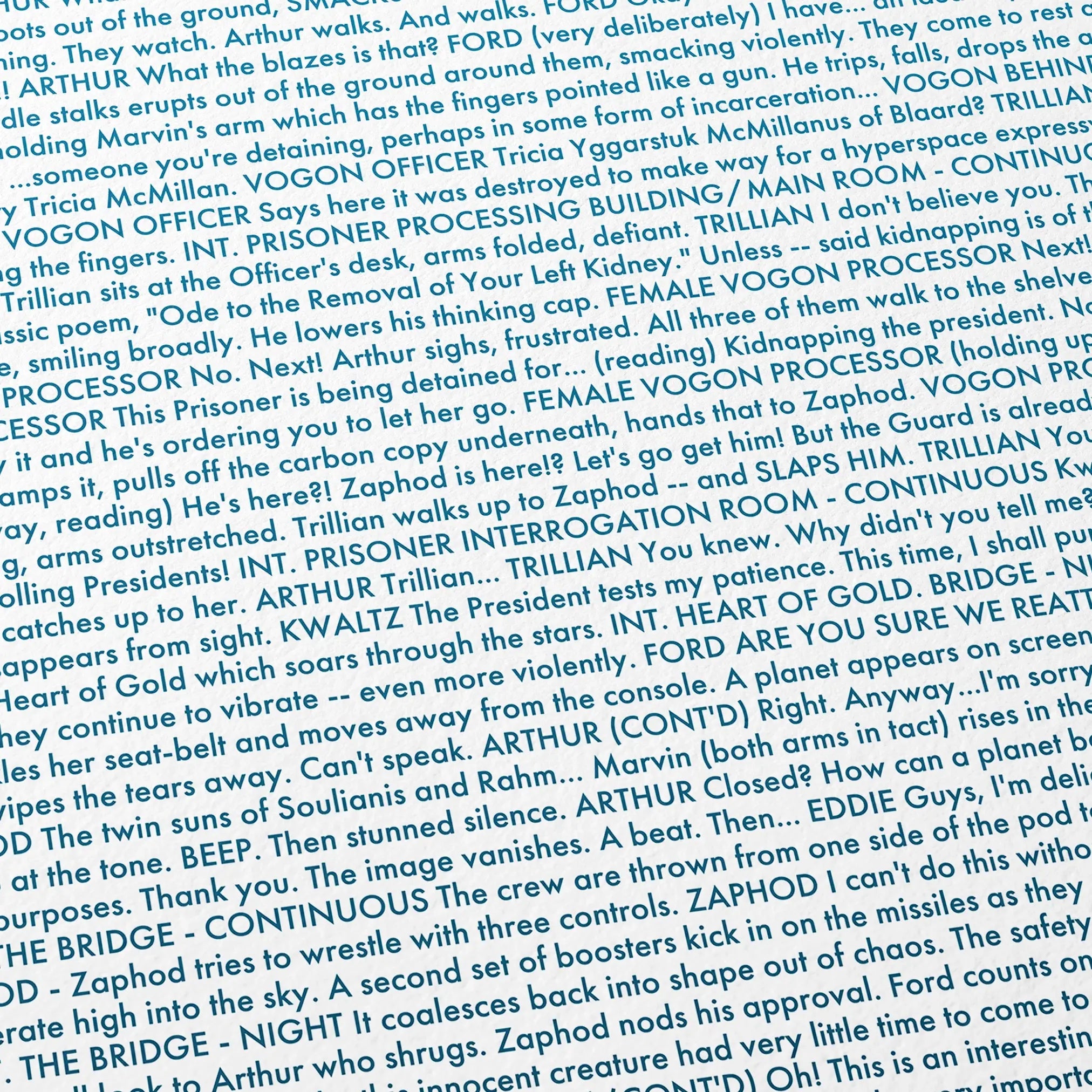 Close-up detail of the The Hitchhiker's Guide to the Galaxy movie script poster showing dense typographic text.