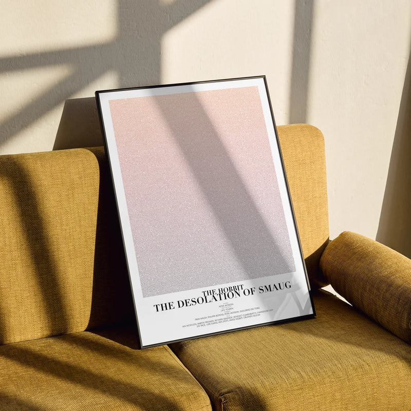 A framed The Hobbit: The Desolation of Smaug movie script poster styled in a clean interior setting.