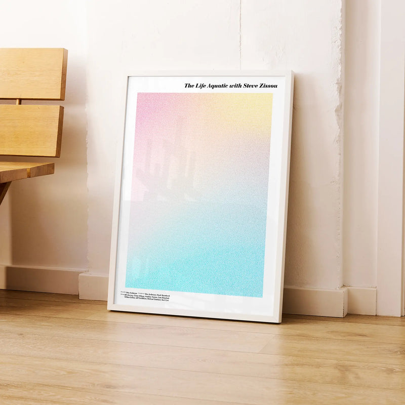 A framed The Life Aquatic with Steve Zissou movie script poster leaning against a wall in a modern interior.