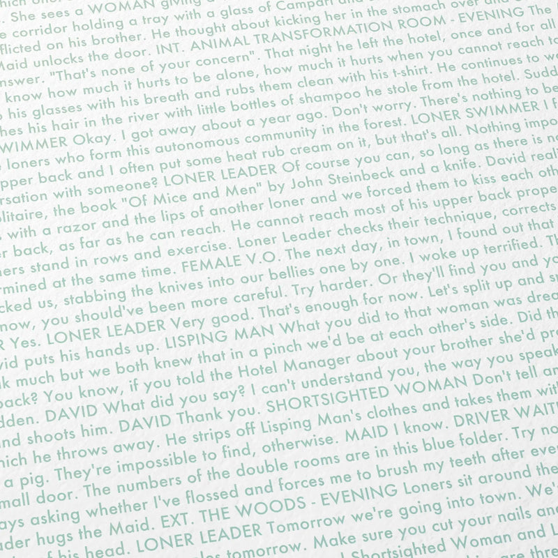 Close-up detail of the The Lobster movie script poster showing dense typographic text.