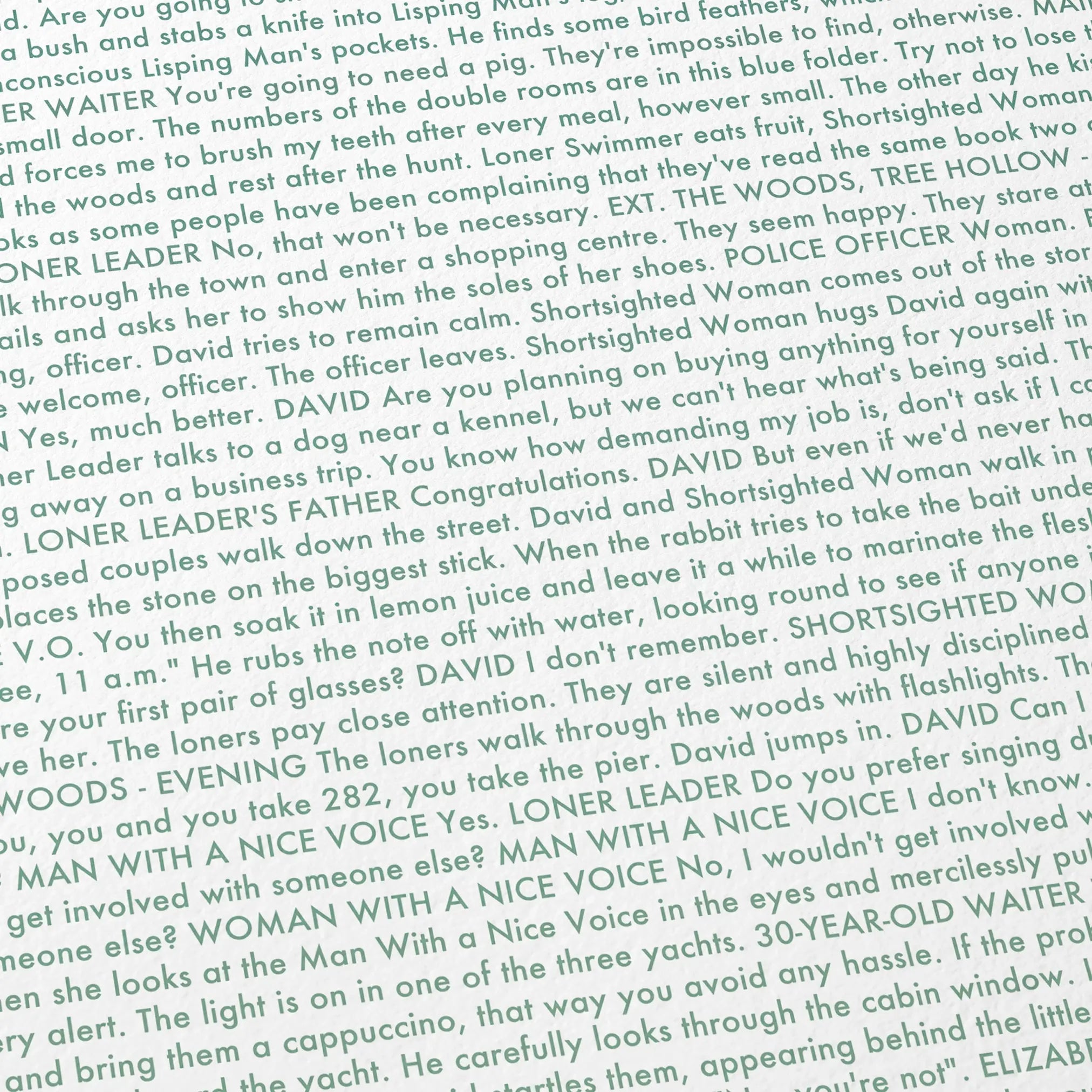Close-up detail of the The Lobster movie script poster showing dense typographic text.