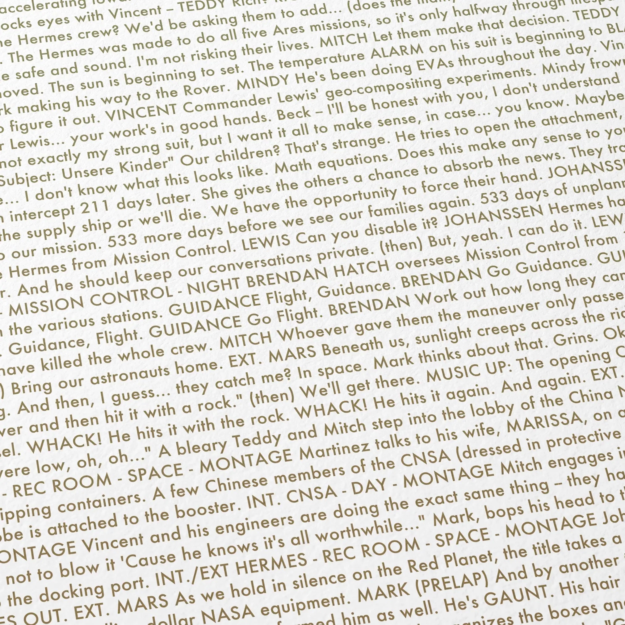 Close-up detail of the The Martian movie script poster showing dense typographic text.