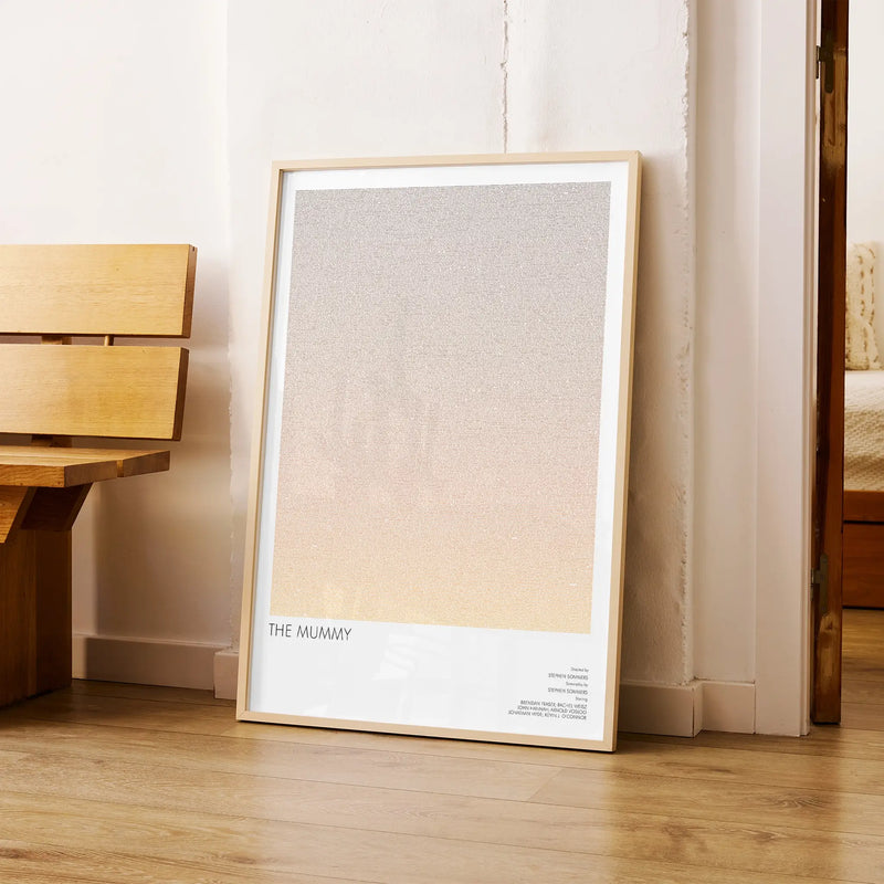 A framed The Mummy movie script poster arranged in a minimalist interior setting.