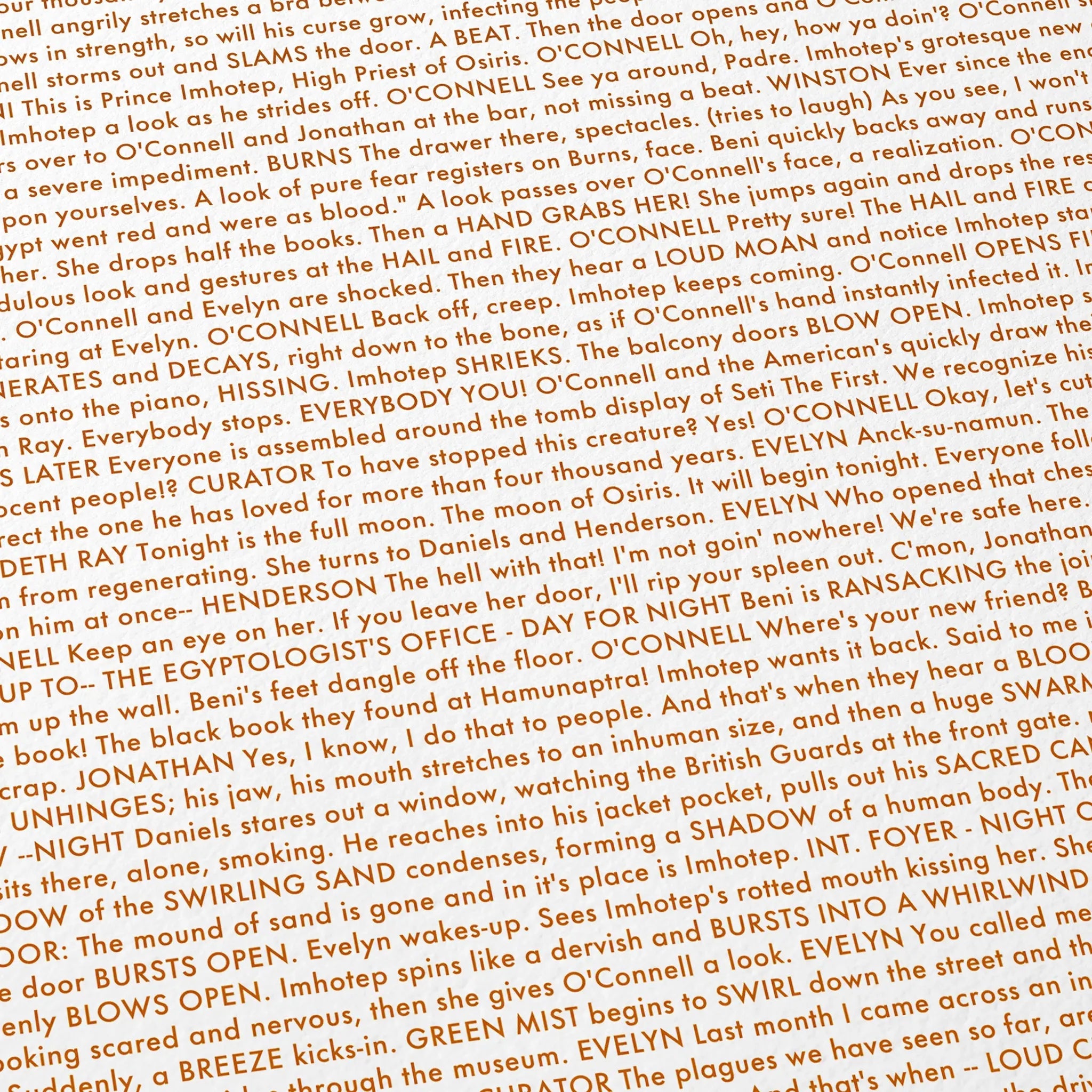 Close-up detail of the The Mummy movie script poster showing dense typographic text.