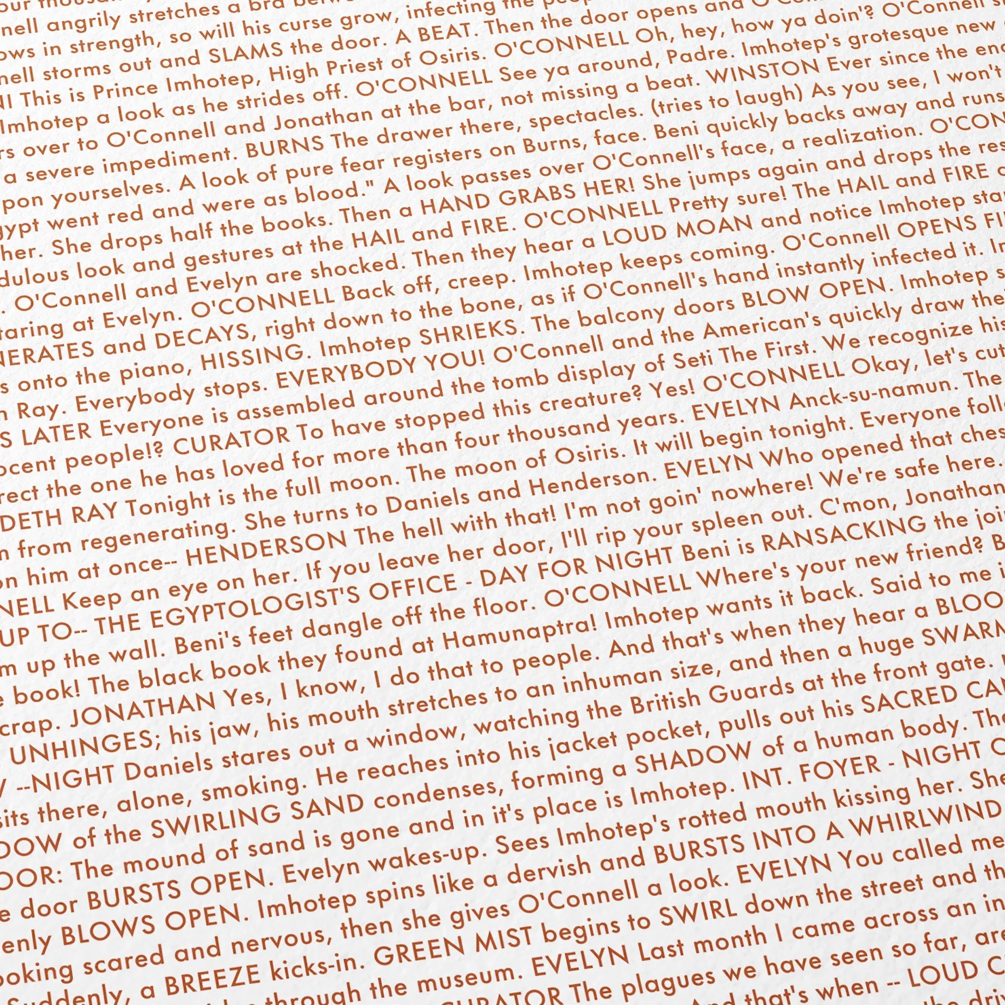 Close-up detail of the The Mummy movie script poster showing dense typographic text.