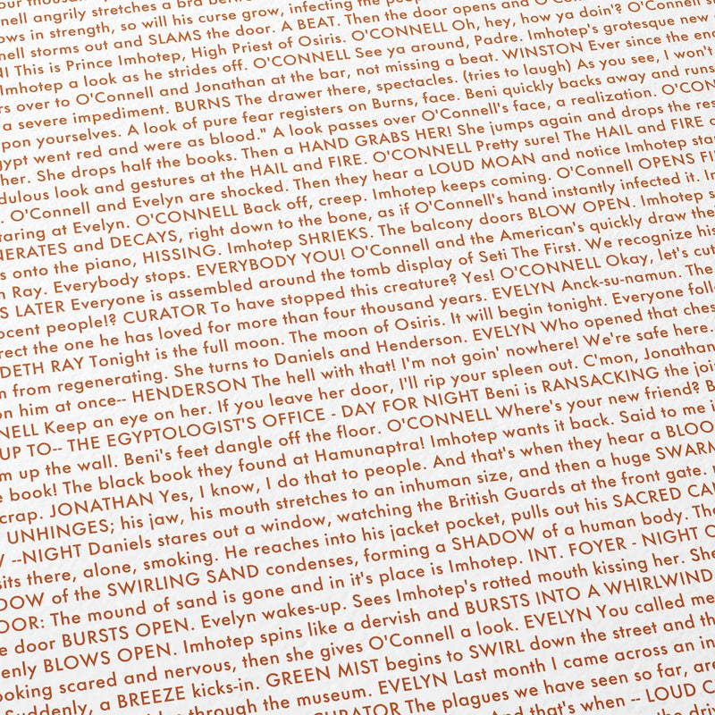 Close-up detail of the The Mummy movie script poster showing dense typographic text.